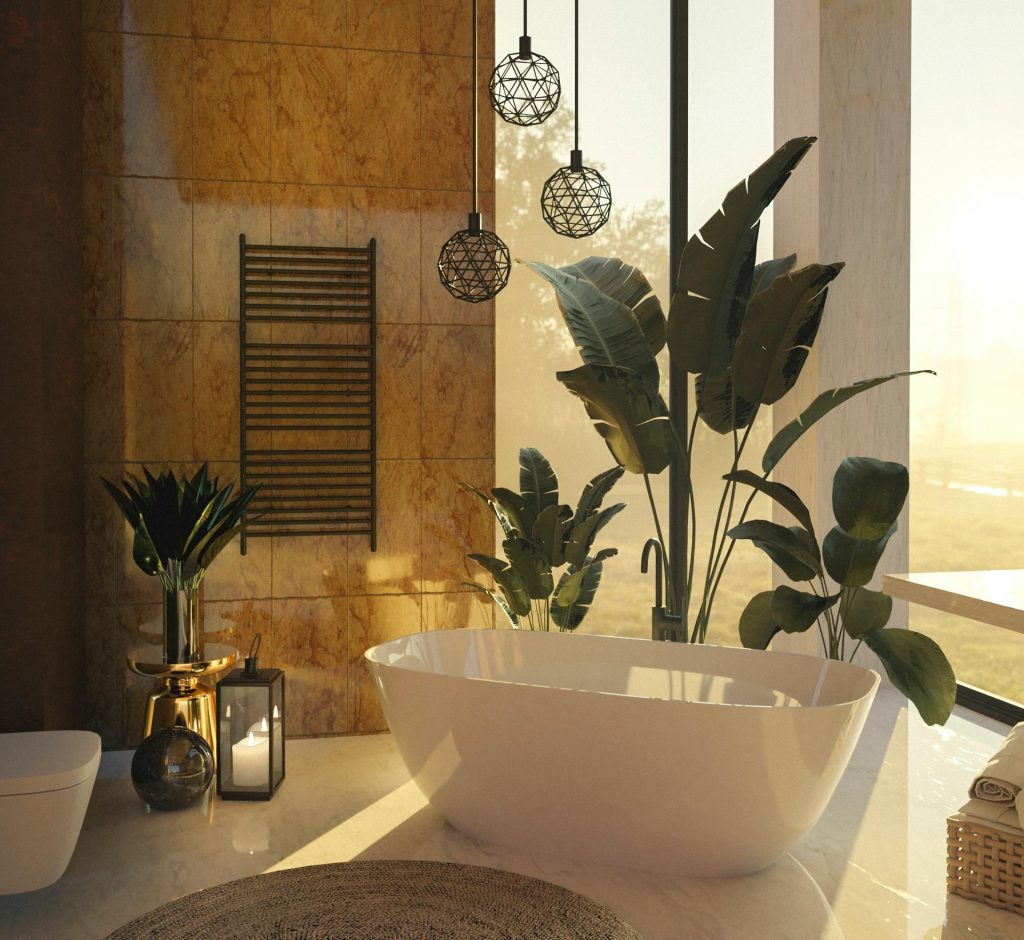 Minimalist bathroom with a freestanding bathtub, indoor plants, warm lighting, and spa-style atmosphere